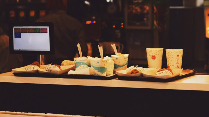 Photo by Firas Wardhana a tray of food sitting on top of a counter